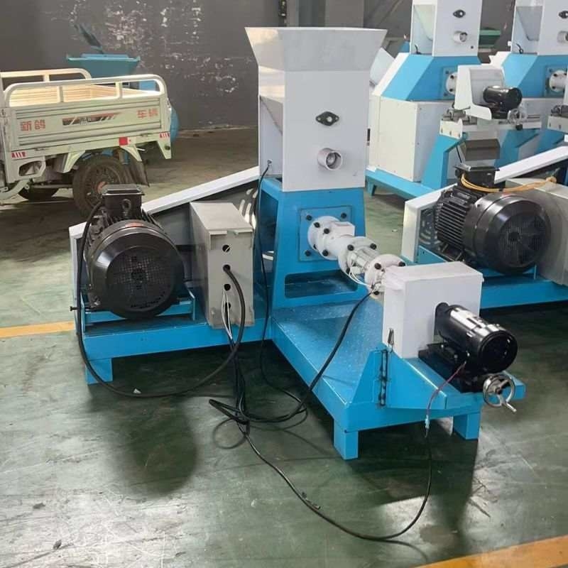 इलेक्ट्रिक स्टीम हीटिंग ड्राई टाइप फिश फ़ूड एक्सट्रूडर ट्रिफेज पावर और 50-2000 किलोग्राम/घंटा क्षमता के साथ