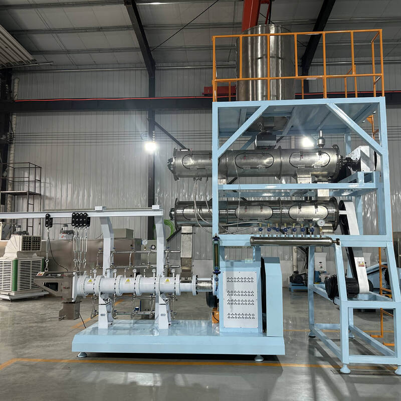 मल्टीफंक्शनल सिंगल ट्विन स्क्रू फ़ूड एक्सट्रूज़न लाइन 500KG/H-10T/H स्टेनलेस स्टील निर्माण के साथ मछली फ़ूड और पालतू जानवरों के भोजन के उत्पादन के लिए क्षमता
